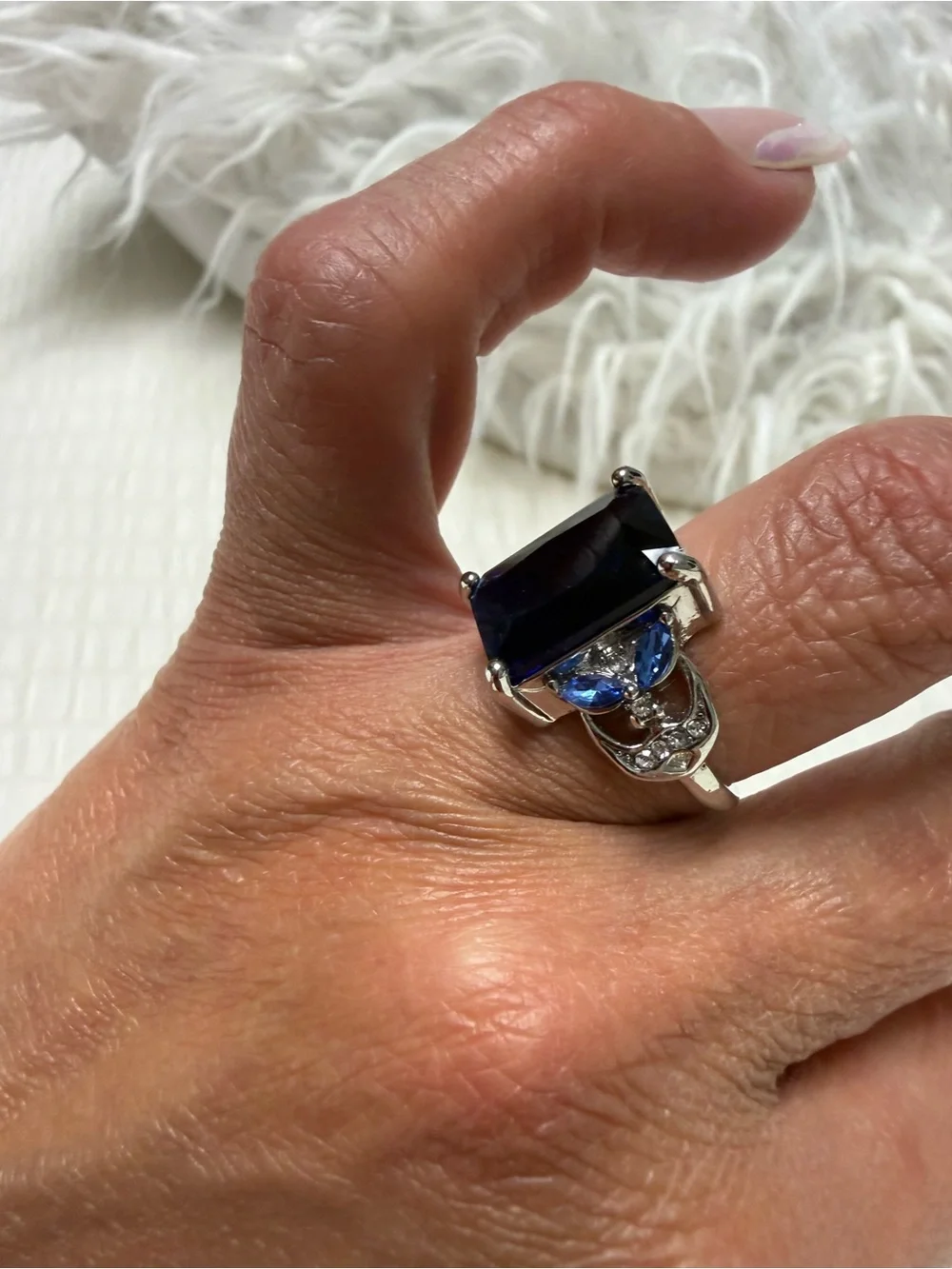 Silver Ring with Dark Blue Center Stone and Light Blue Accents